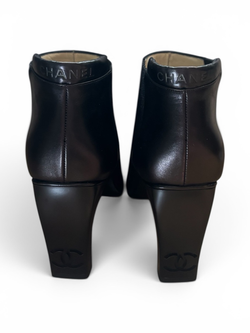 CHANEL Black Leather Ankle Boots with Sculpted Heel